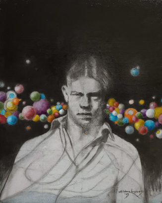 young man's portrait with coloured balls